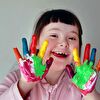 Girl showing her painted hands