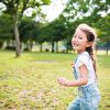 Little girl running and laughing