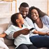 Family Enjoying Time Together While Watching TV