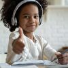Girl With Headphones Showing Thumb Up